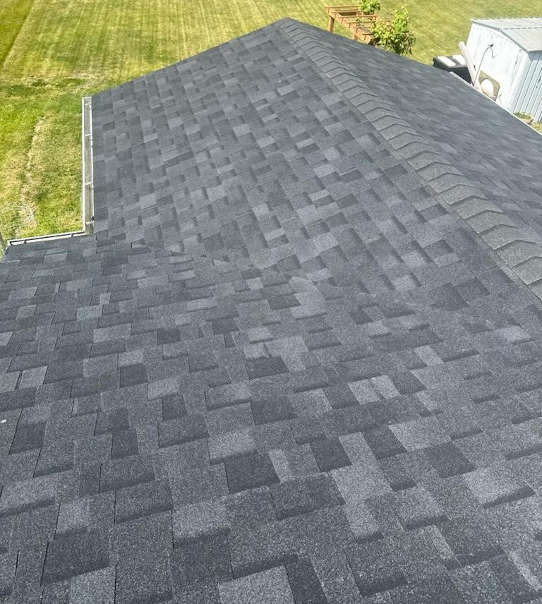 Crew replacing a roof